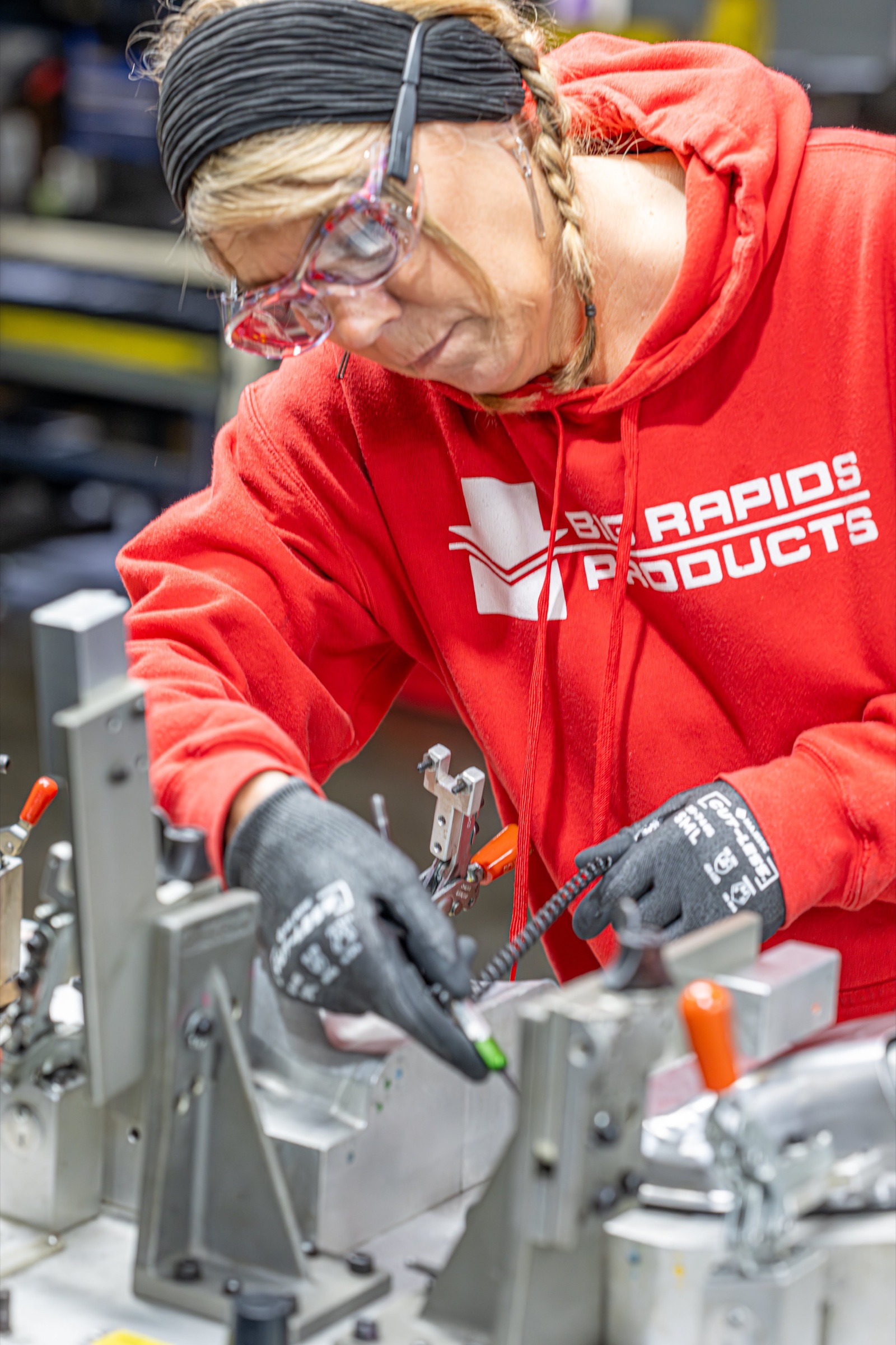 Big Rapids Products quality team member inspecting a production fixture